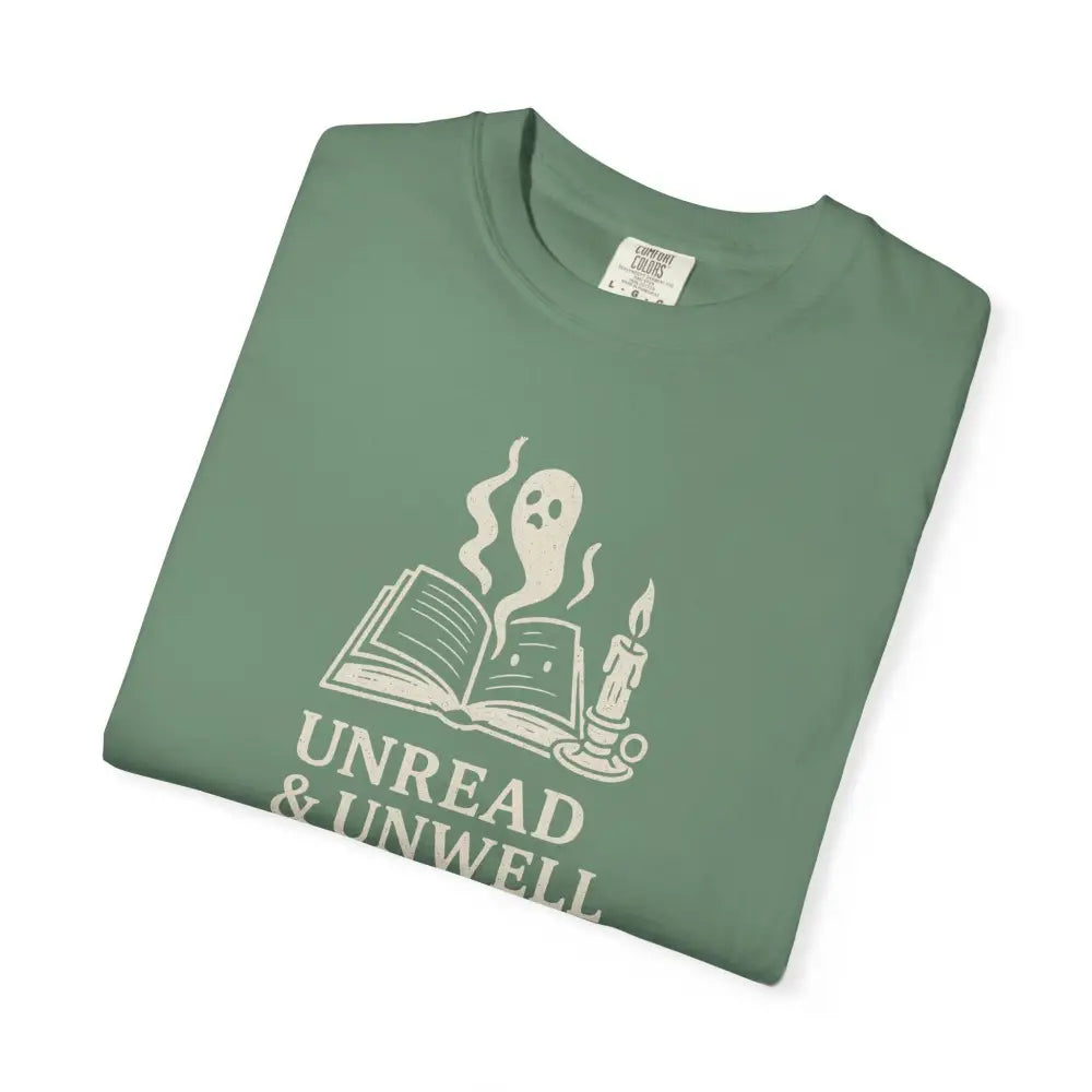 Folded Unwell Ghost Tee in green with book and candle design