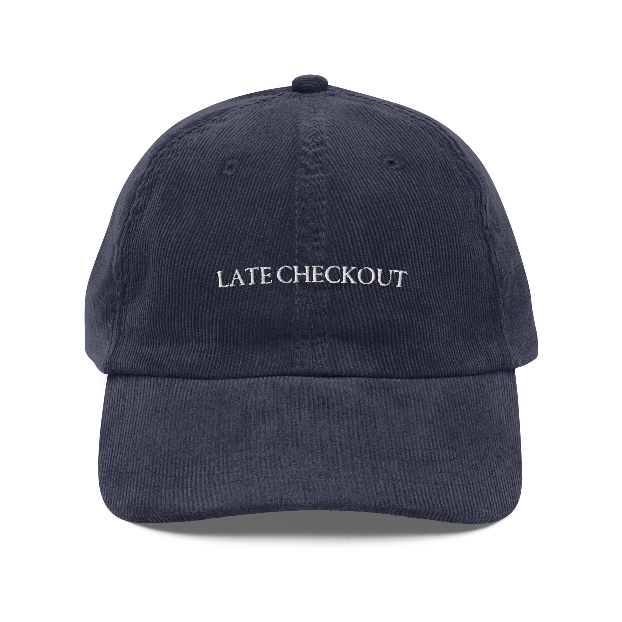 Navy blue corduroy dad cap with Late Checkout embroidery