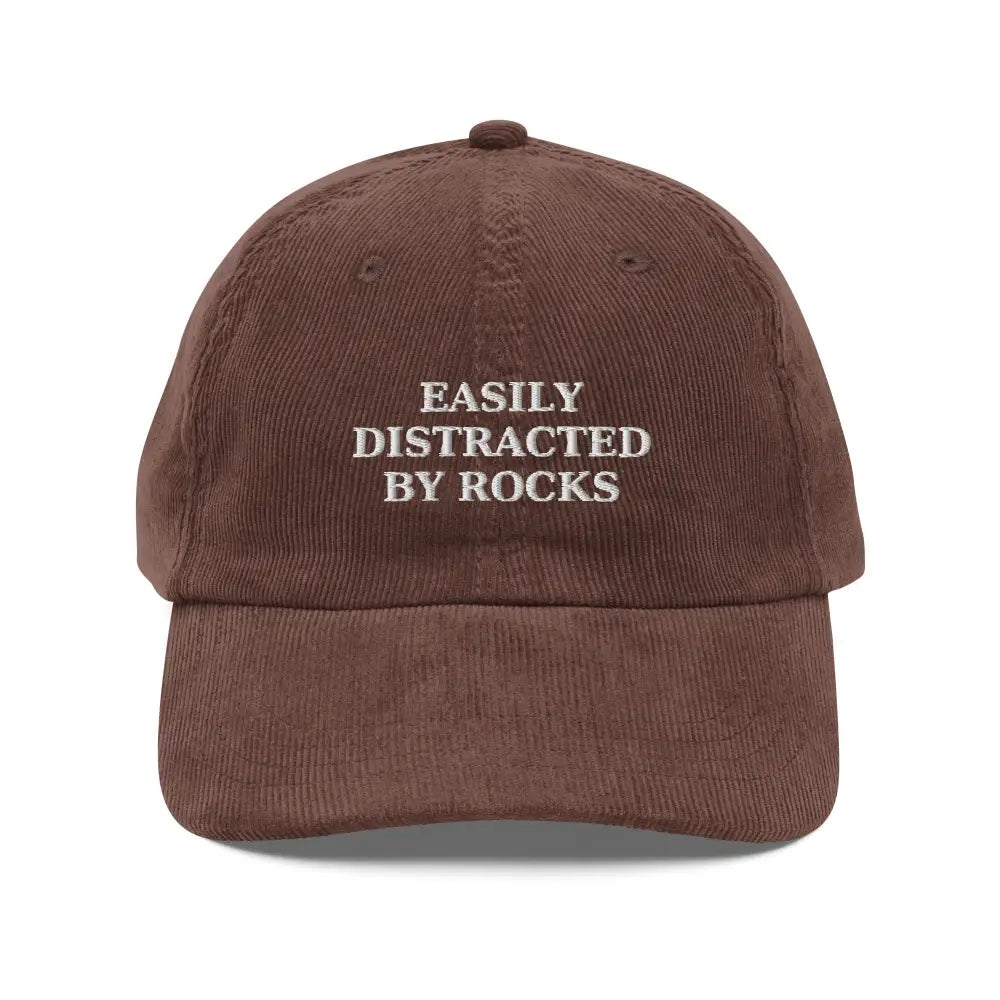 Brown vintage corduroy cap with embroidered easily distracted text