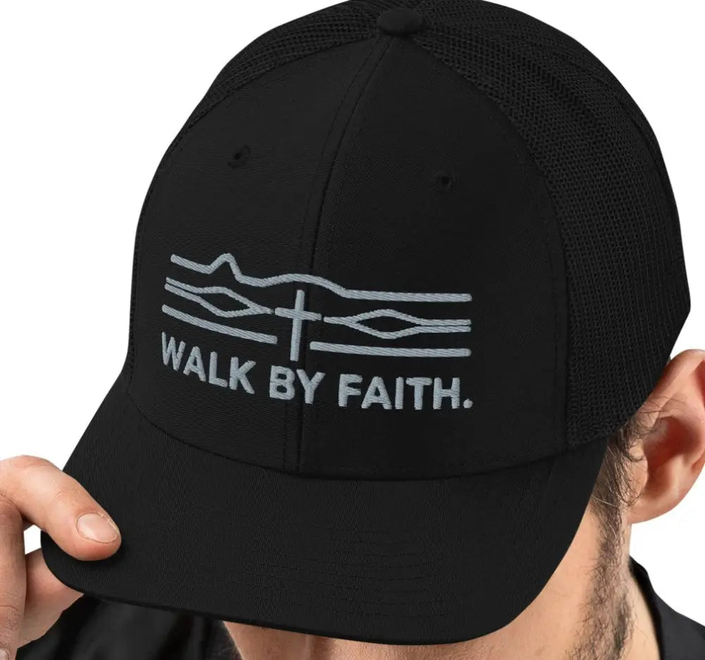 Black mesh trucker hat with Walk By Faith cross embroidery