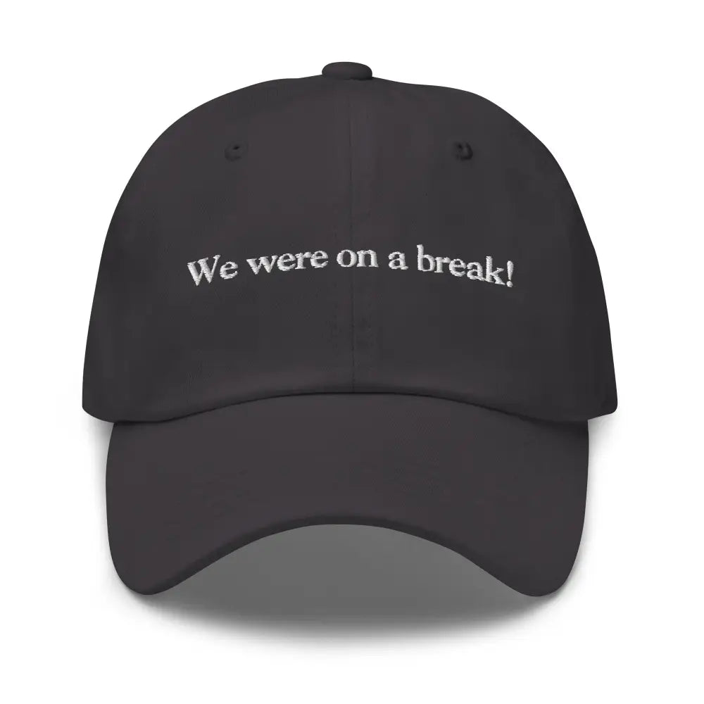 Dark gray embroidered dad hat with We were on a break white text