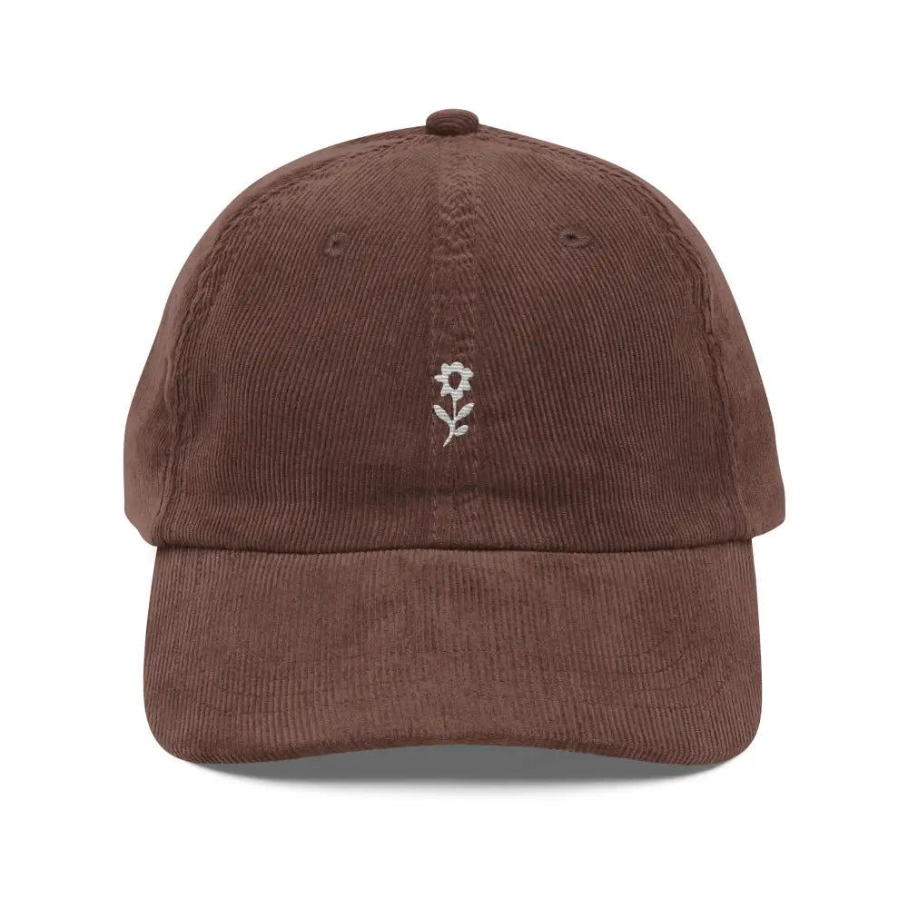 Brown corduroy baseball cap with white embroidered wildflower, effortlessly stylish from Trini Skies Supply