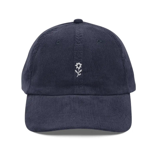 Dark blue corduroy baseball cap with embroidered wildflower design by Trini Skies Supply