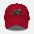 Embroidered dad hat with red cap and Worm Class green worm in glasses and bow tie