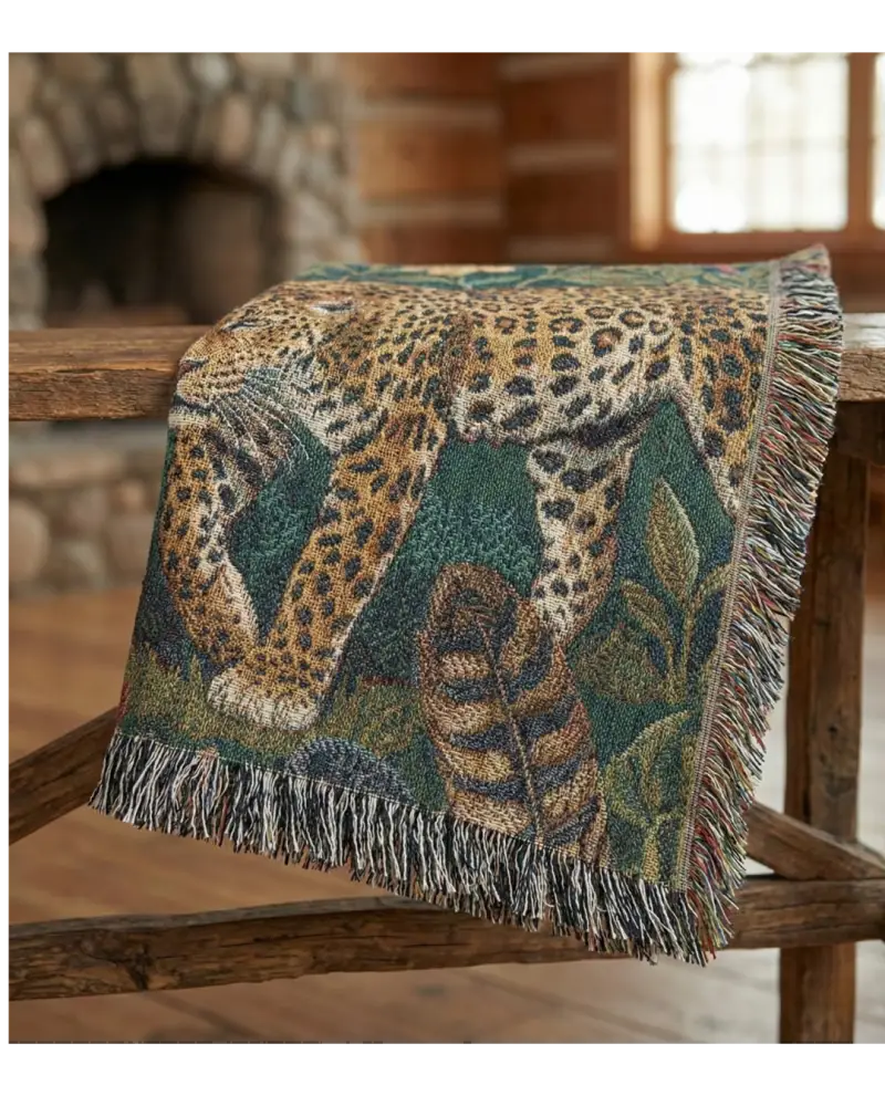 Woven tapestry throw with luxury jacquard leopard wildlife design