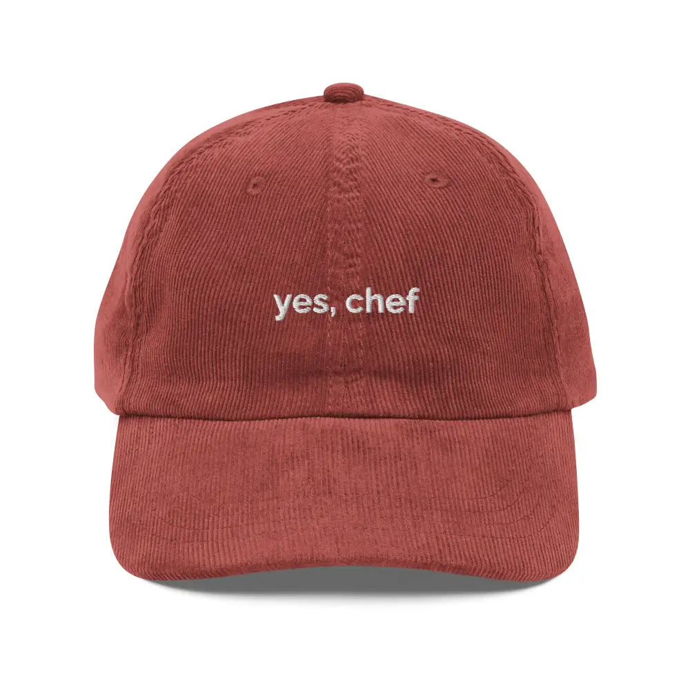 Red embroidered corduroy cap with Yes Chef vintage culinary story