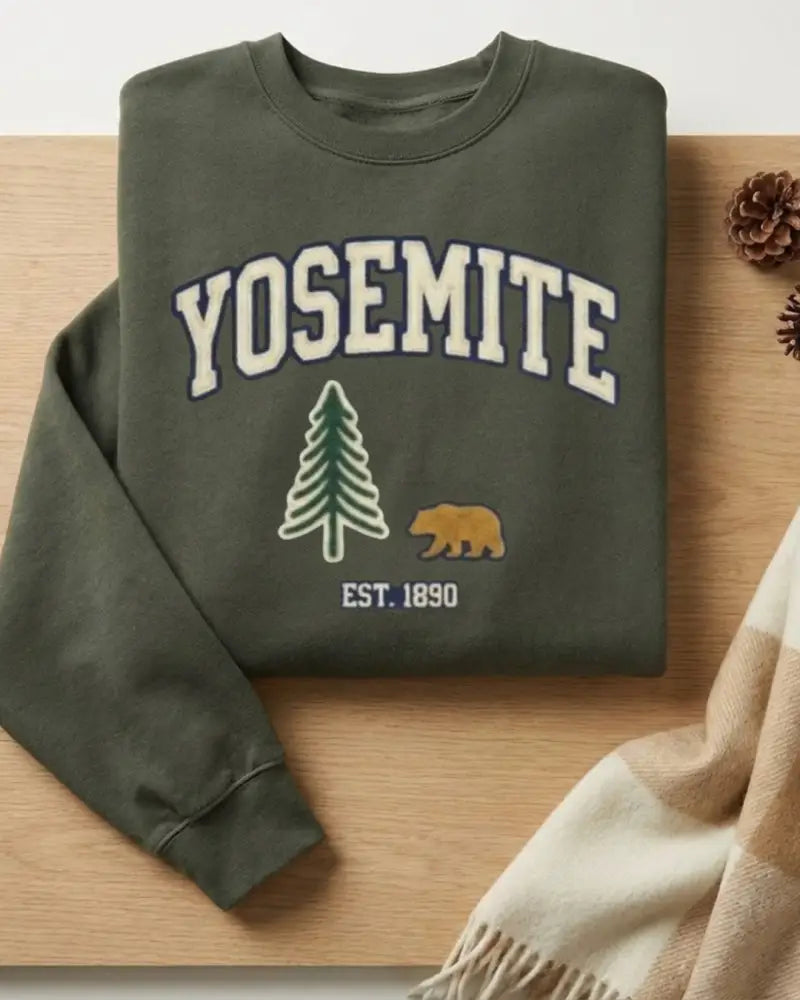 Olive green Yosemite National Park sweatshirt with bear and tree design, established 1890